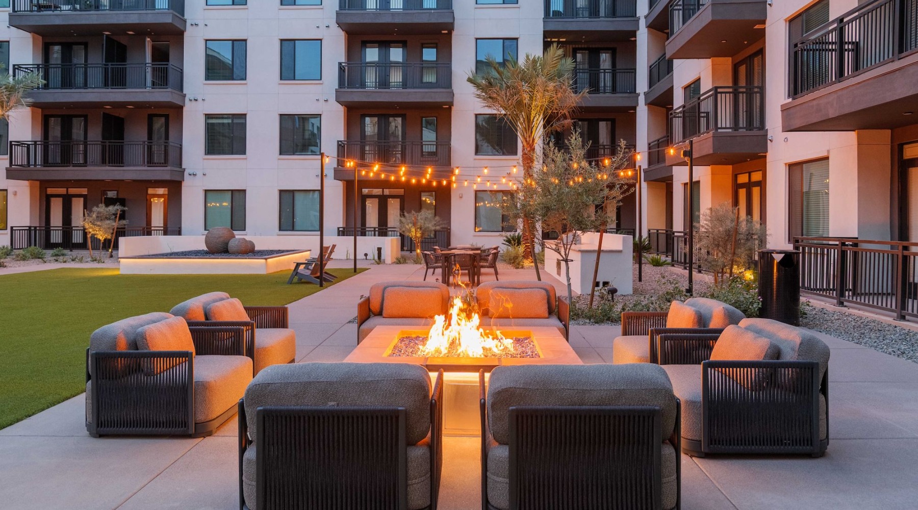 an outdoor fire pit on a lawn
