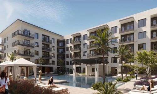 a group of people walking around a building